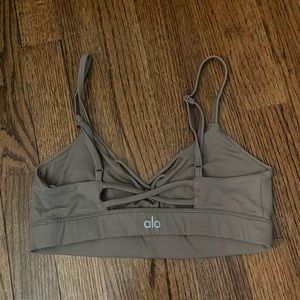 Grey Criss Cross Alo sports bra with adjustable straps